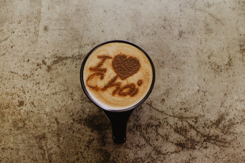 “i heart chai” written on masala chai with cinnamon